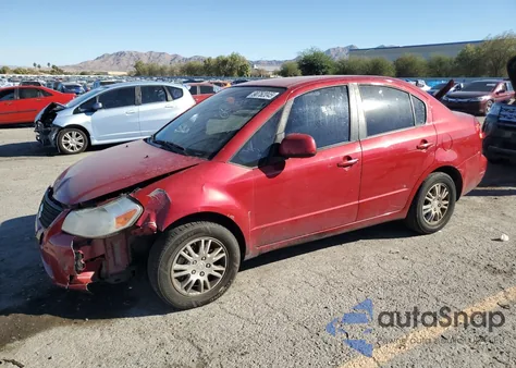 2012 Suzuki Sx4 Le z USA, uszkodzony, nr VIN JS2YC5A38C6302398